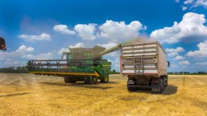The Real Benefits of Harvest Hauling with Hopper Bottom Trailers